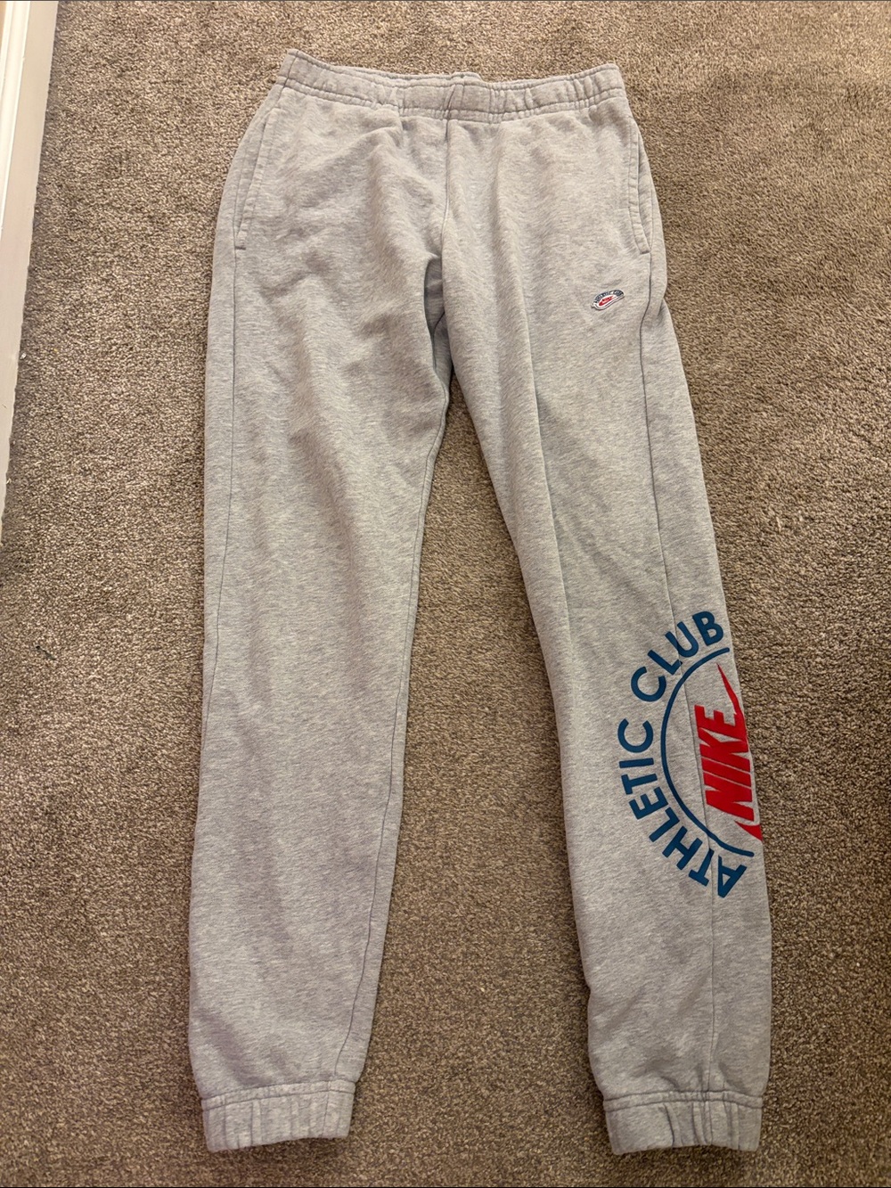 Nike Gray Athletic Club Logo Sweatpants with Red & Blue Accents